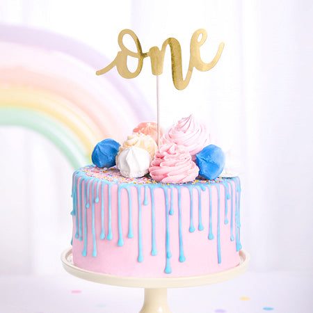 1st birthday party decorations — gold number 1 balloon and balloon display